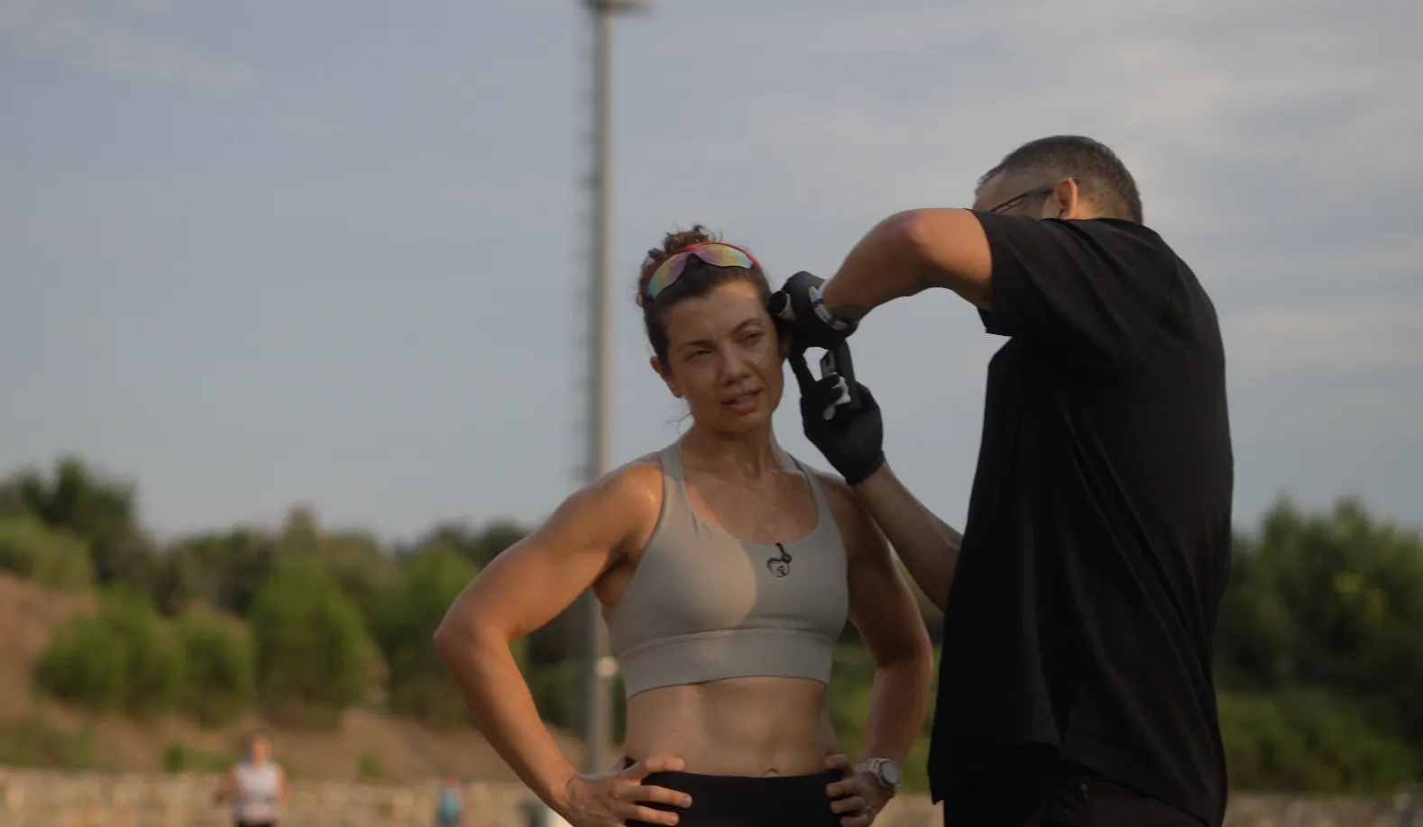 Nihal having a blood lactate sample taken from her ear during a lactate threshold test